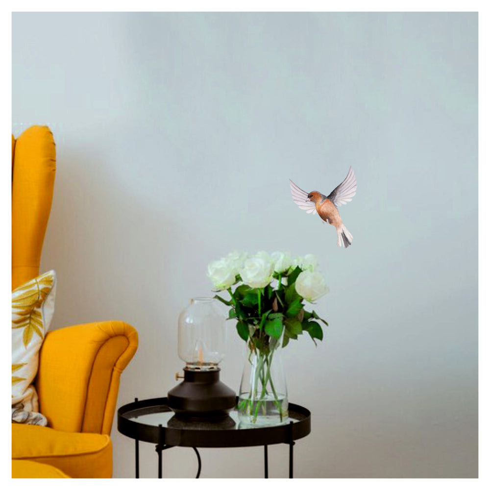 Chaffinch Bird Wall Sticker above side table with flowers – home décor decal
