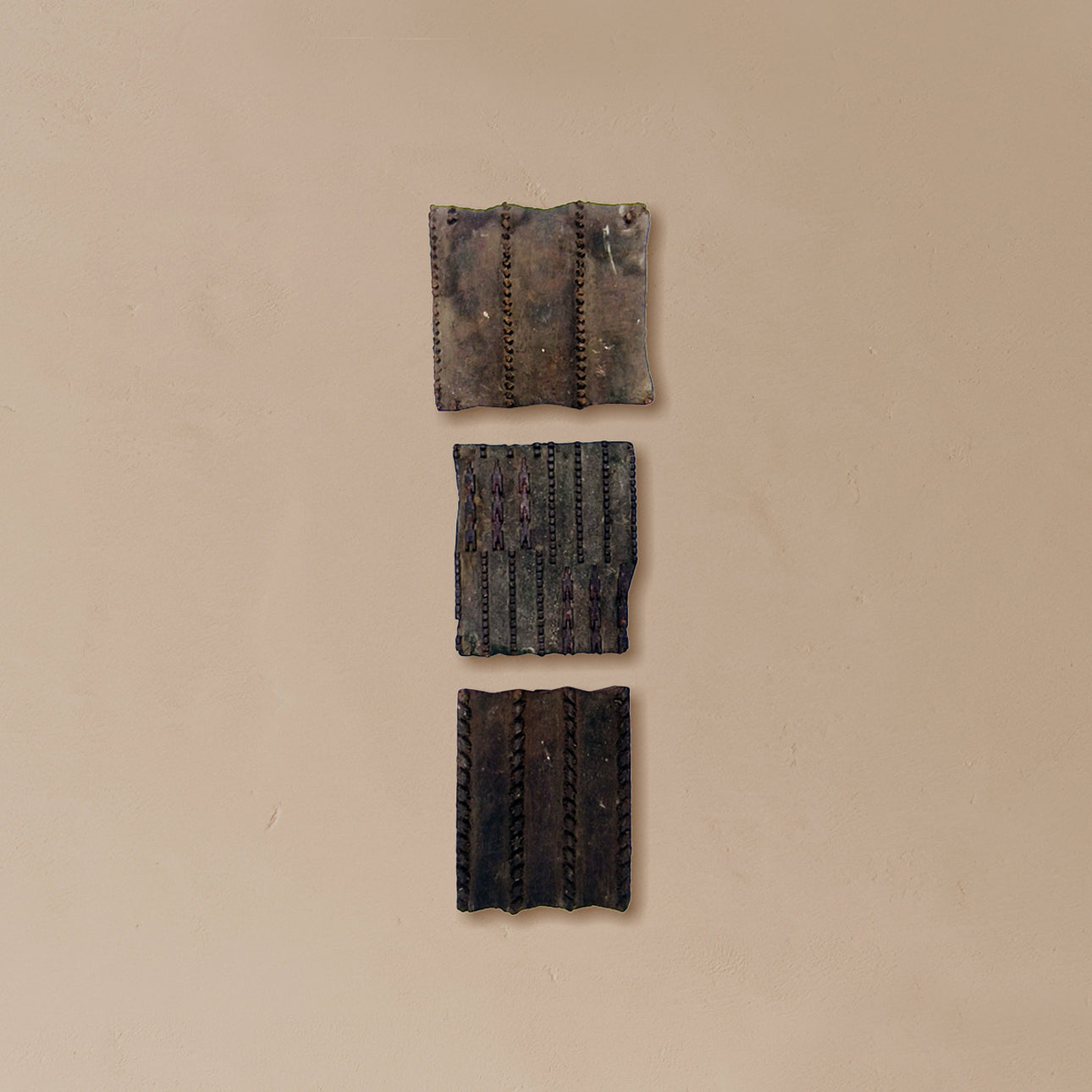 Set of 3 antique wooden printing blocks with carved patterns
