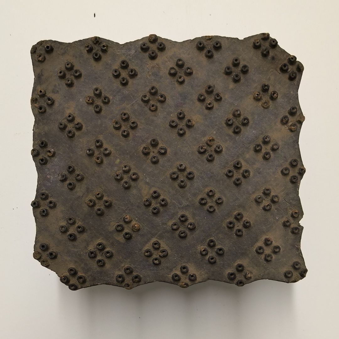 Vintage Indian wooden printing block featuring dotted floral cluster design