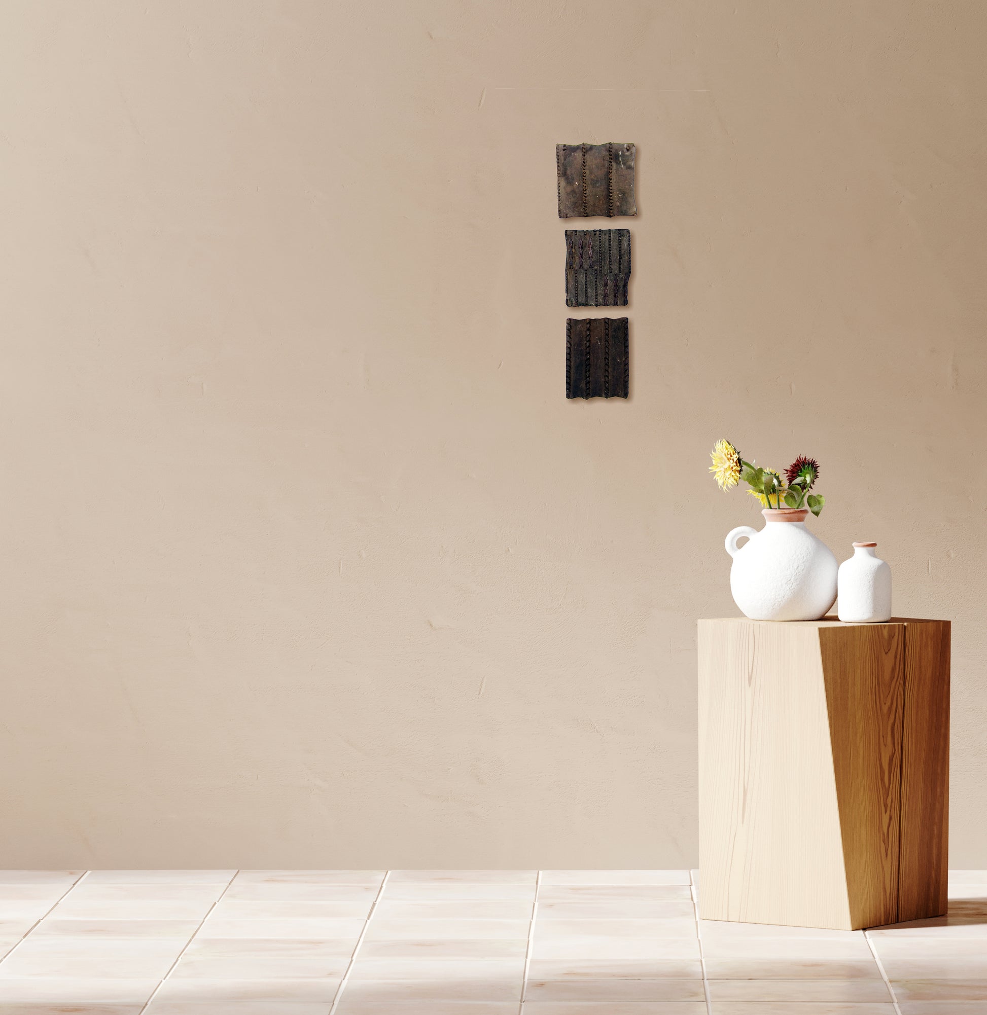 Wooden printing blocks displayed as wall décor in a living room