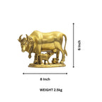 Handcrafted brass cow and calf statue dimensions 8x6 inches, weighing 2.5kg, ideal for Vastu and home decor.