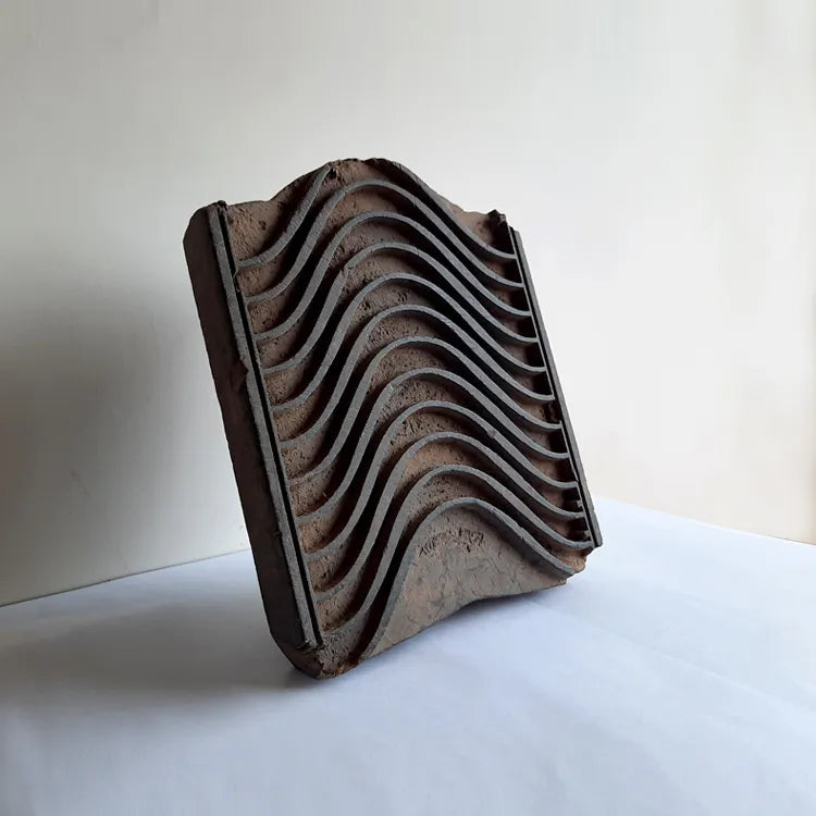 Wave decorated wooden block