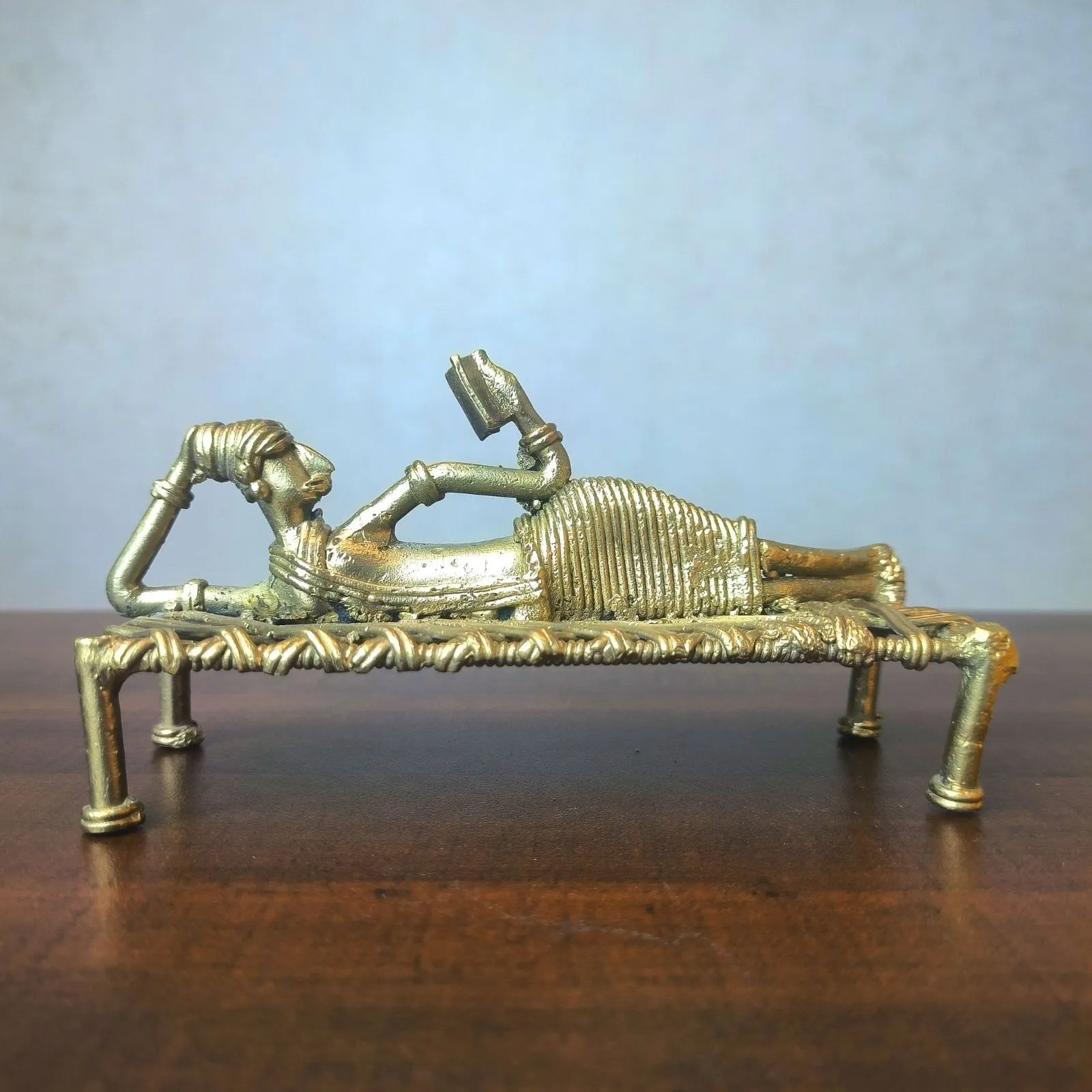 Dhokra Tribal Lady Reading Book Sleeping on Cot Decor