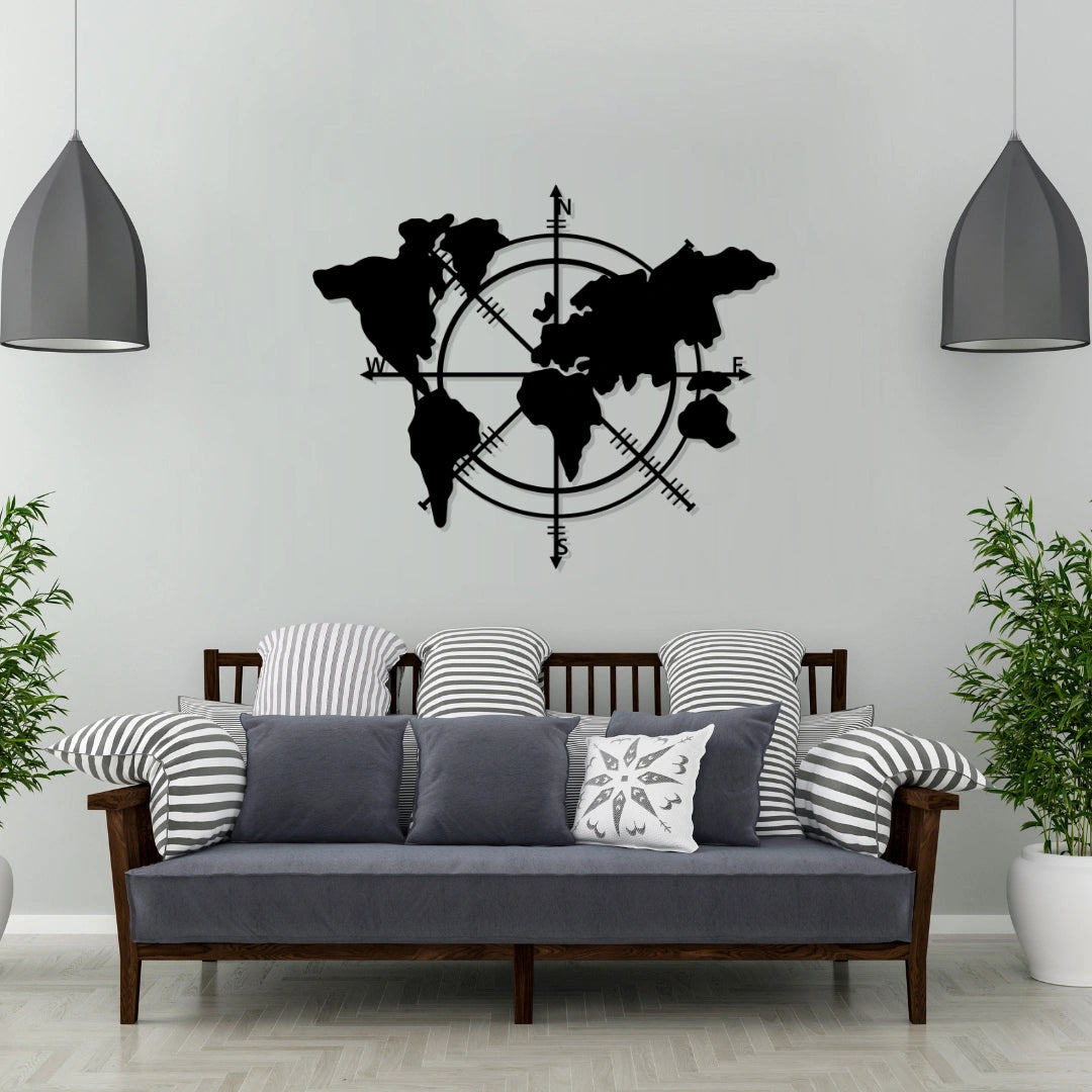 Matte black metal world map wall decor with compass motif above sofa in modern living room