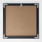 Back of frame showing wall-mount hanger and hanging wire
