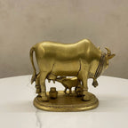 Brass Kamdhenu cow and calf idol statue for home decor, back view