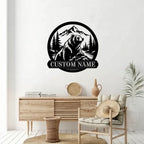 Custom name bear metal wall art in matte black on blue textured wall in modern living room