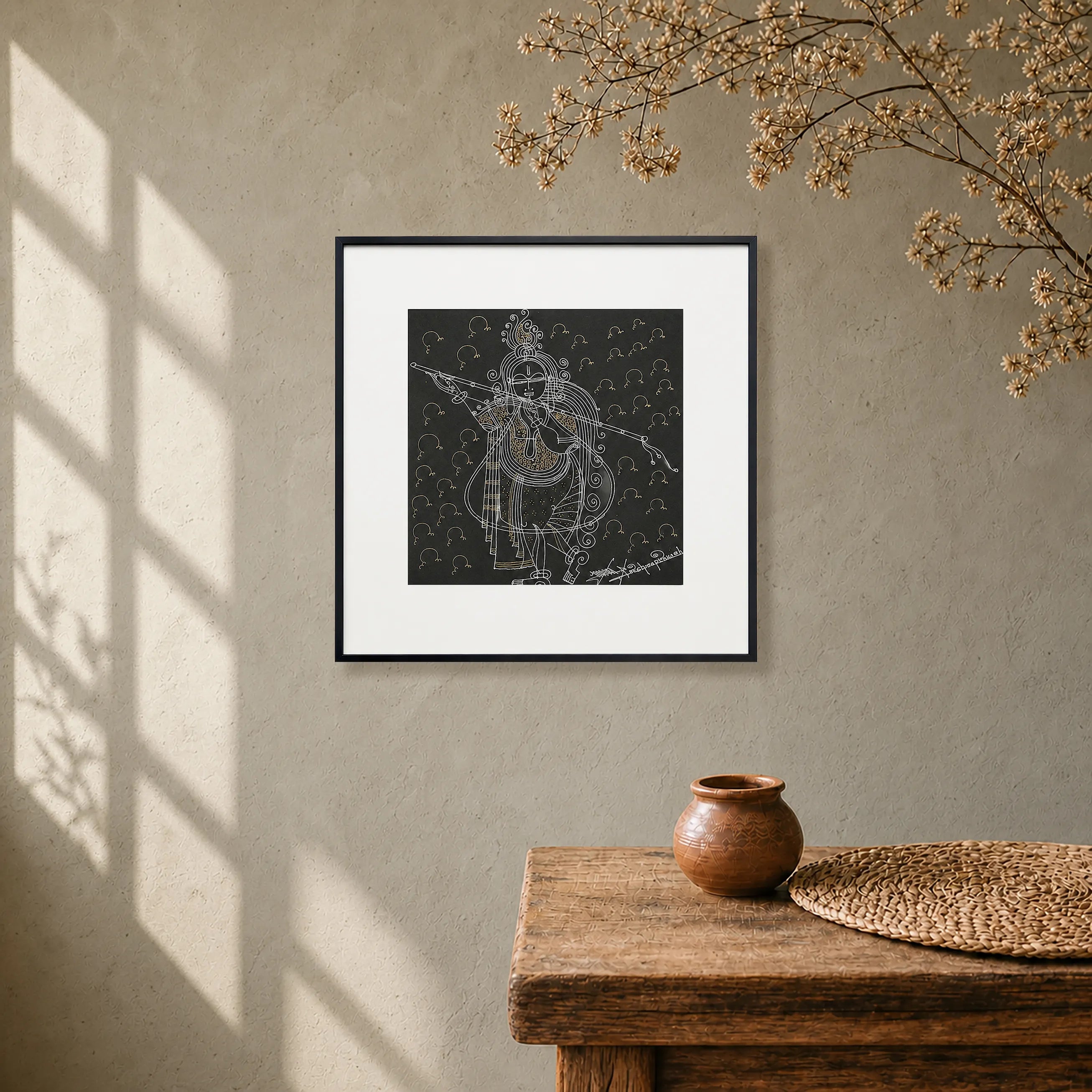 Framed Krishna Surpur art painting hanging above a console table on a wall
