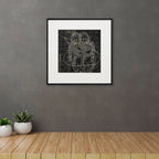 Framed Radha-Krishna Surpur art painting hanging above a console table on a wall
