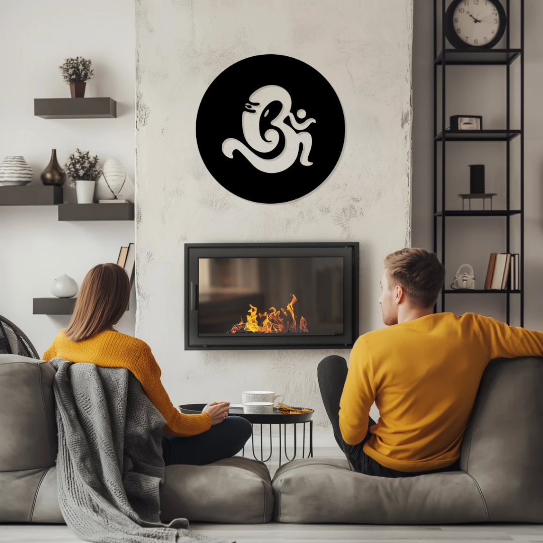 Om Ganesha metal wall art round black decor above sofa with colorful cushions – modern Hindu home decor