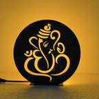 Lord Ganesha Table Lamp glowing warm LED light on table, front view
