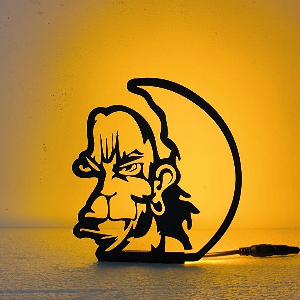 Lord Hanuman Tablelamp glowing warm LED light on table, front view