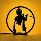 Lord Krishna Table Lamp glowing warm LED light on table, front view