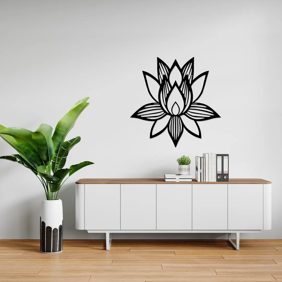 Lotus flower metal wall art above white cabinet