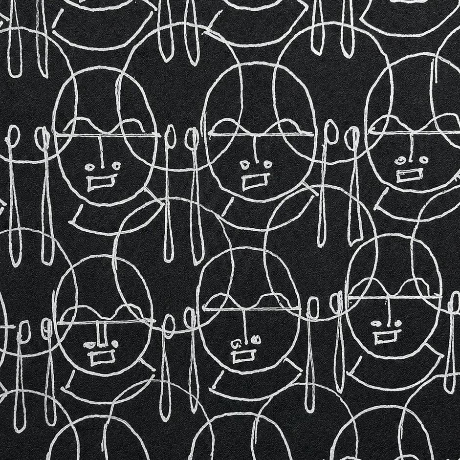 Macro shot of intricate hand-drawn ink linework on Human Faces artwork
