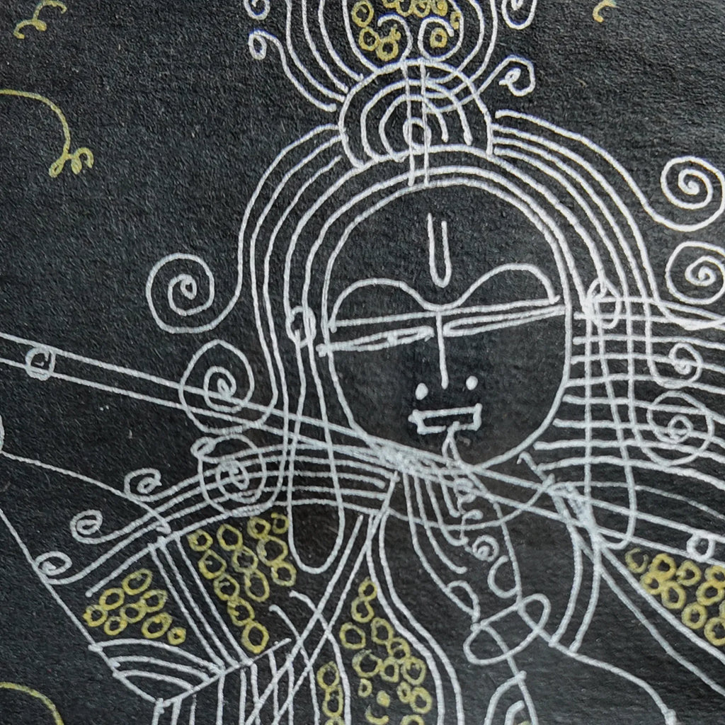 Macro shot of intricate hand-drawn ink linework on Krishna artwork
