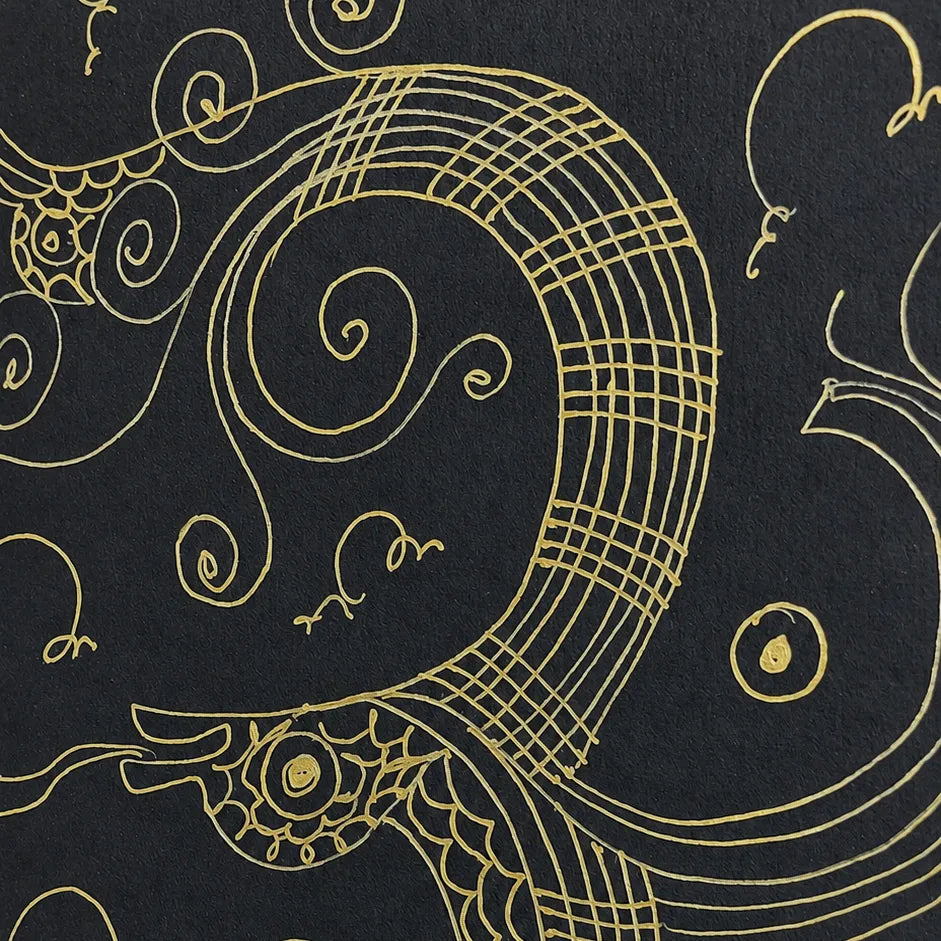 Macro shot of intricate hand-drawn ink linework on Om Shree Namah artwork
