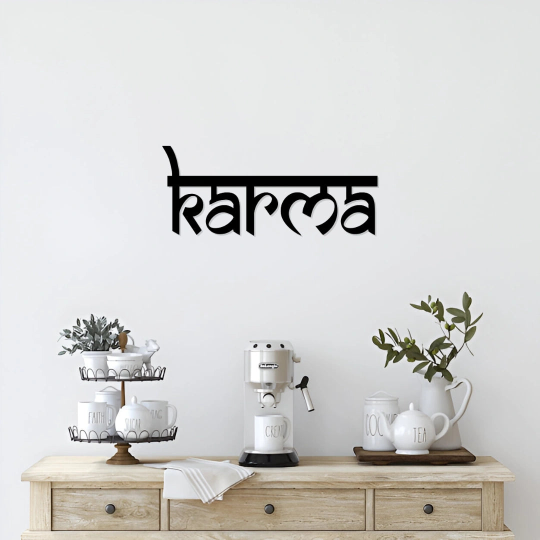 Matte black “Karma” metal wall decor 24x10 inch shown above kitchen counter and coffee station