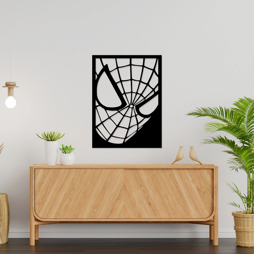 Matte black Spider-Man mask metal wall art decor displayed above wooden sideboard