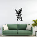 Matte black phoenix bird metal wall art with floral tail displayed above sofa