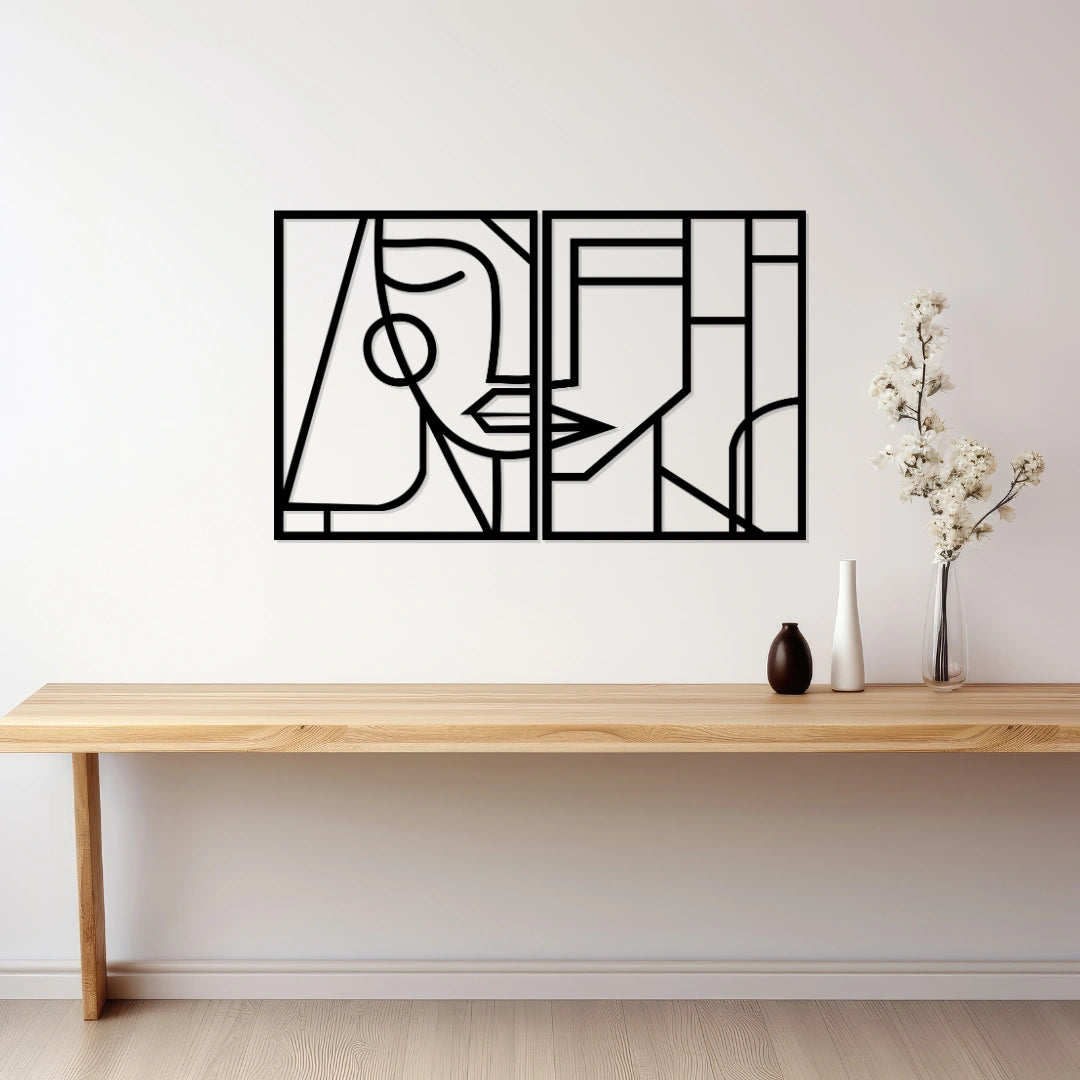 Modern abstract couple face line art metal wall art in matte black above console table