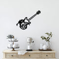 Modern black guitar wall art displayed above a kitchen console table decor setup