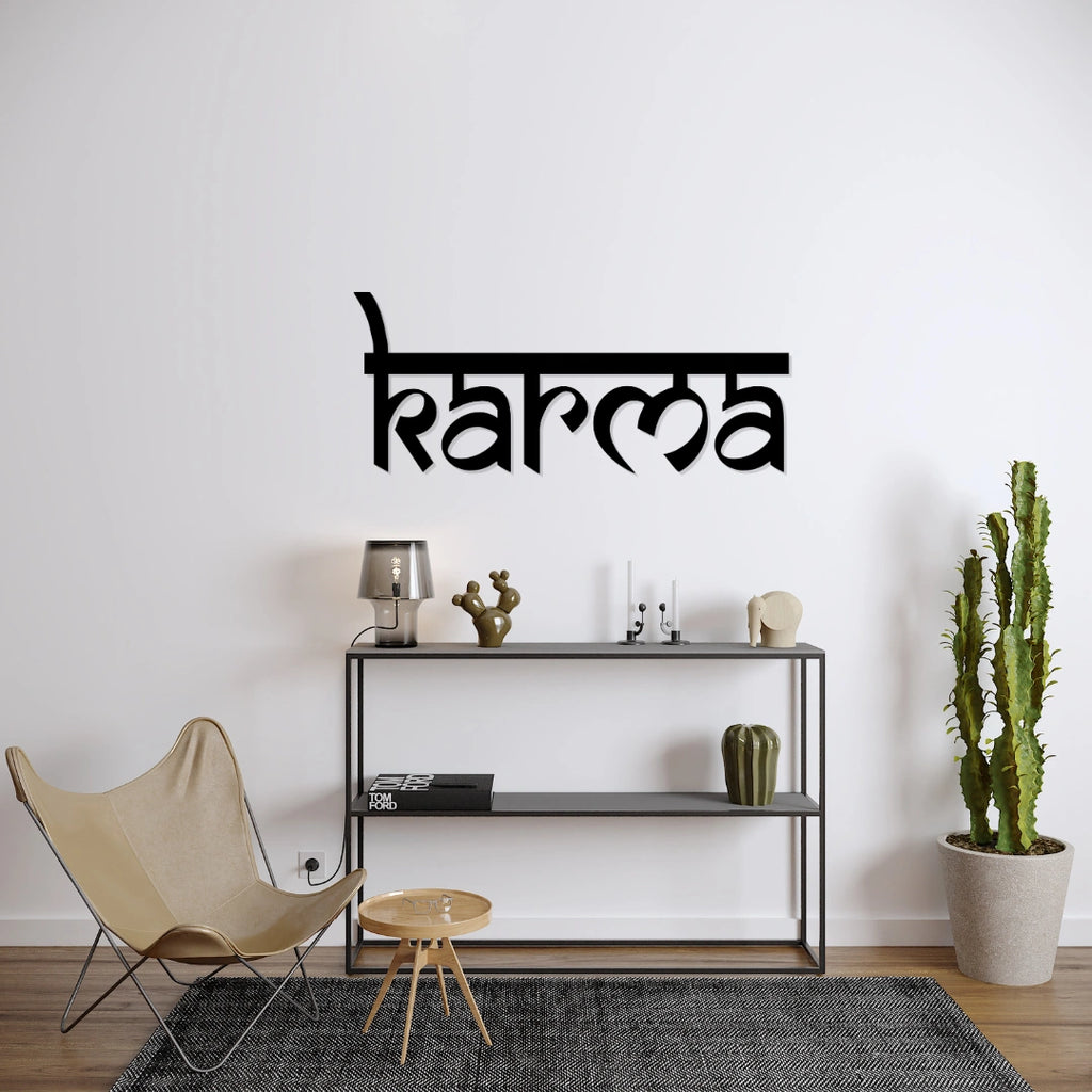 Modern living room styling with matte black “Karma” metal wall art nameplate