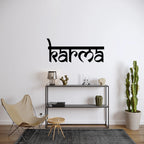 Modern living room styling with matte black “Karma” metal wall art nameplate