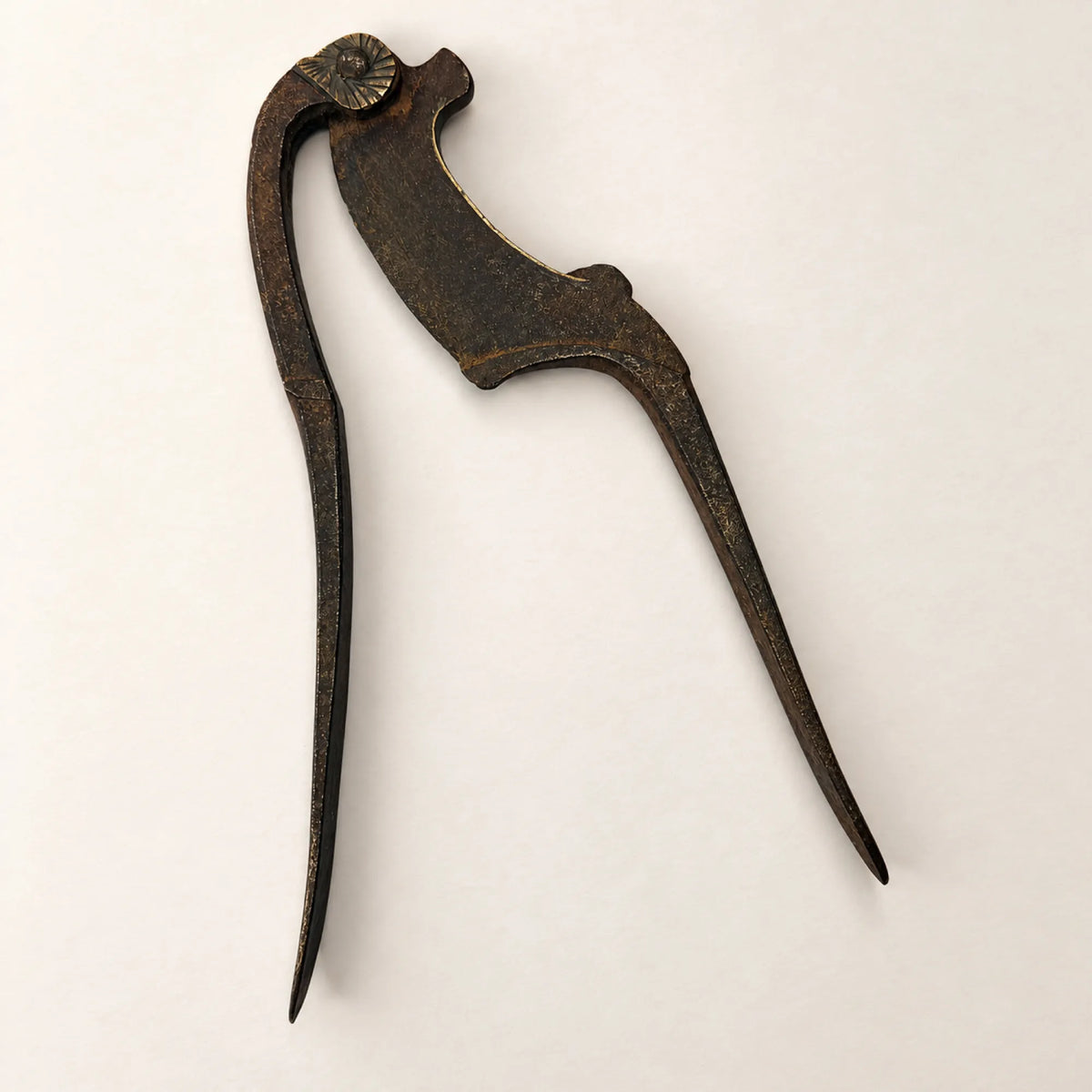 Antique Hand-Forged Nutcracker with Brass Rosette