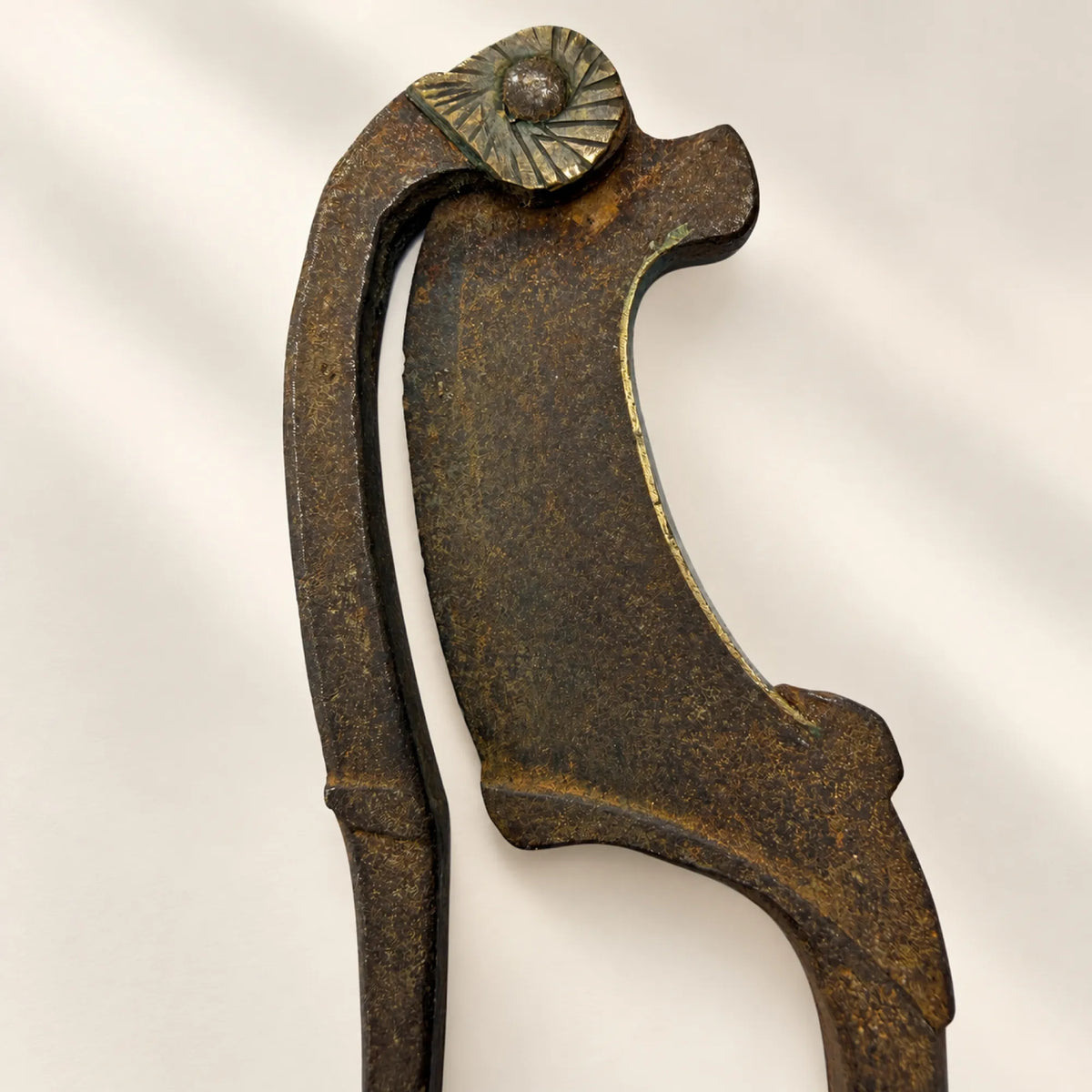 Antique Hand-Forged Nutcracker with Brass Rosette