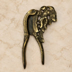 Antique Brass Pierced Nutcracker with Ram Head Motif