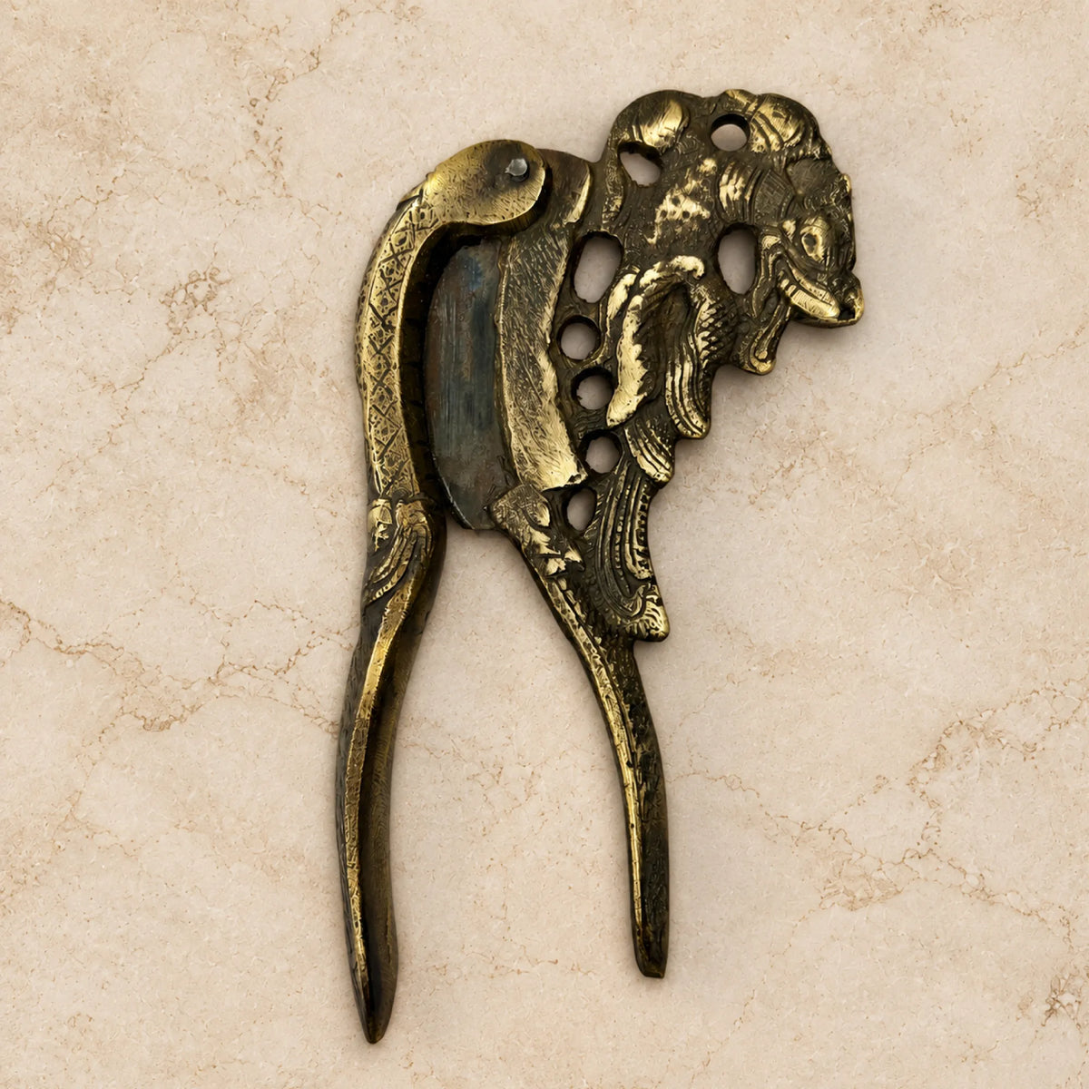 Antique Brass Pierced Nutcracker with Ram Head Motif