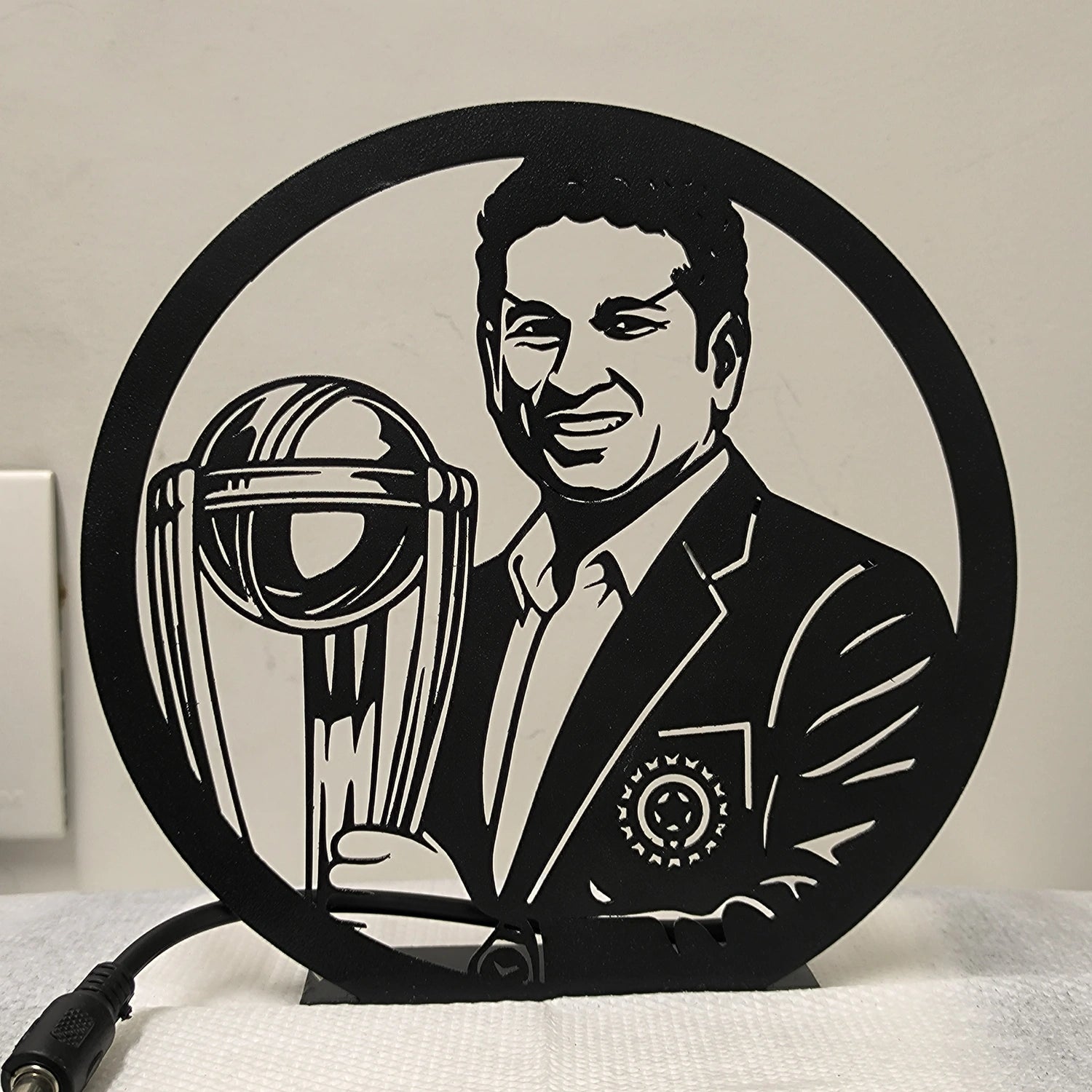 Sachin Tendulkar Table Lamp glowing warm LED light off table, front view