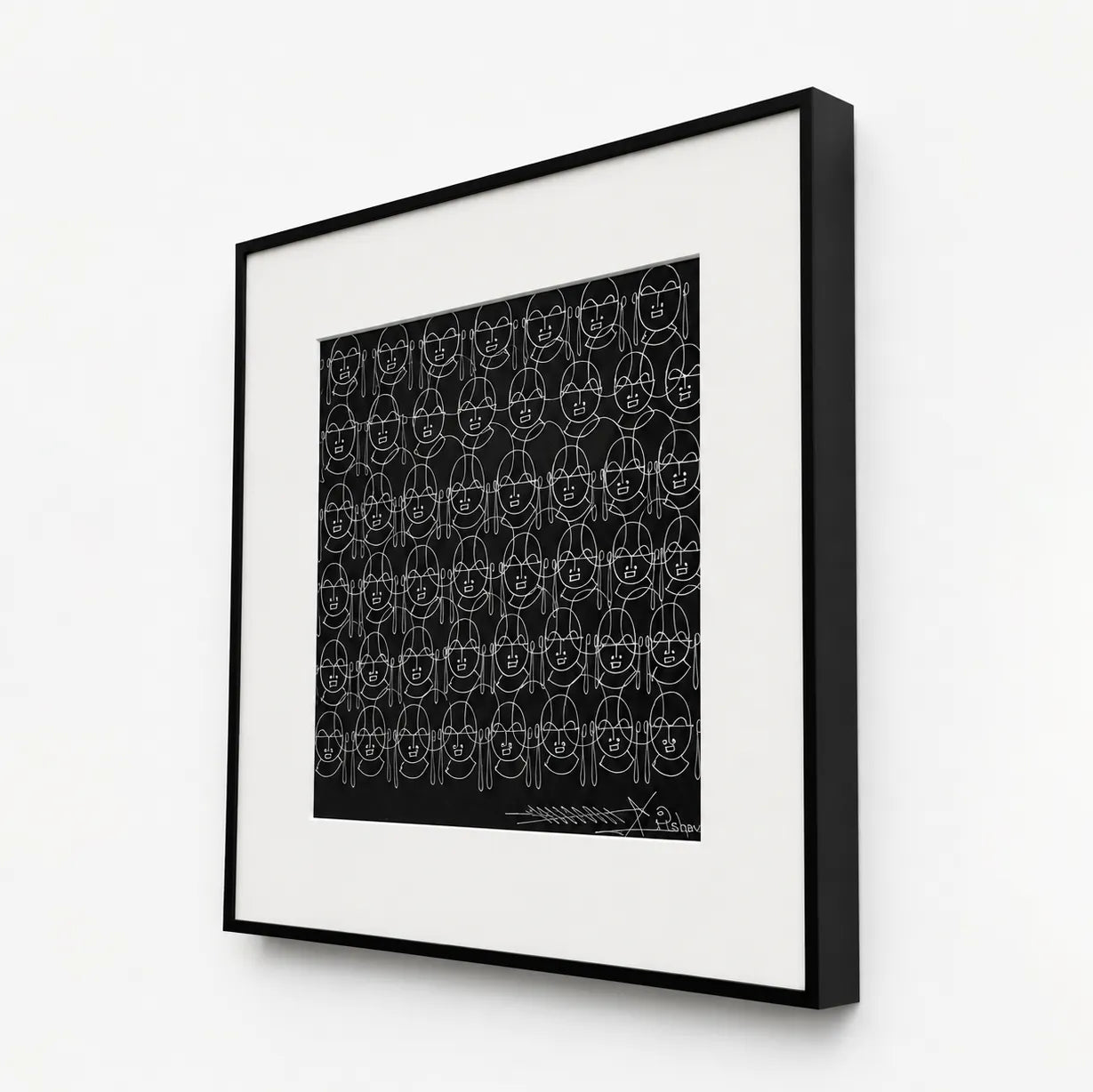 Side angle of black metal frame showing depth on Human Faces wall art
