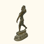 Side profile of the antique brass apsara statue showing the dance posture2