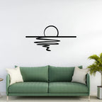 Sunset reflection metal wall art above green sofa