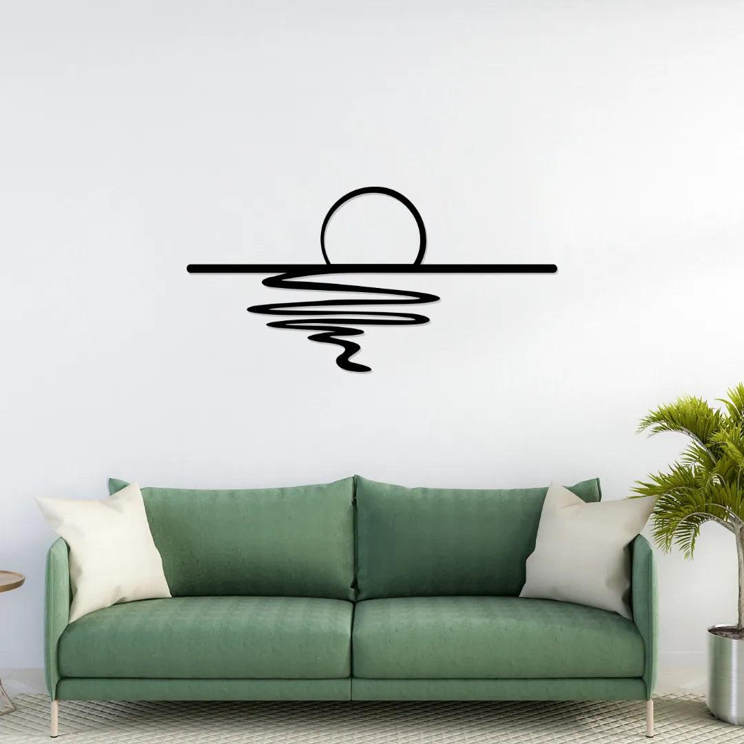 Sunset reflection metal wall art above green sofa