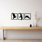 Three piece bird silhouette metal wall decor displayed above console table