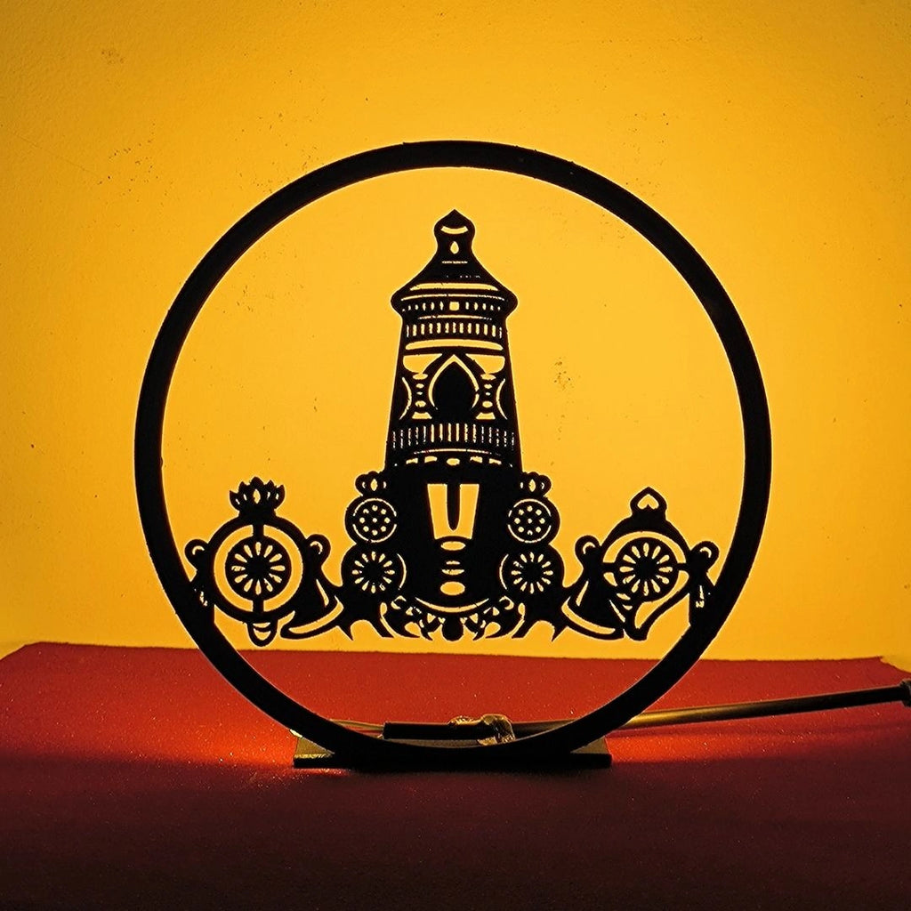 Tirupati Balaji Table Lamp glowing warm LED light on table, front view