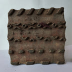 Vintage hand-carved wooden printing block with mixed motif pigment border design
