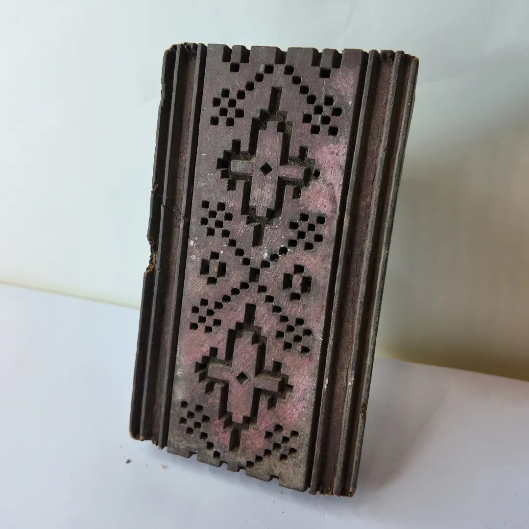 Vintage hand-carved wooden printing block with pixelated diamond cross panel design
