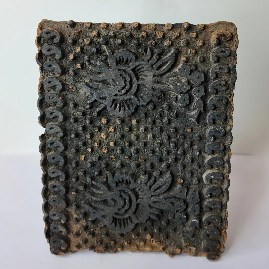Vintage hand-carved wooden printing block with twin rosette checkerboard panel design
