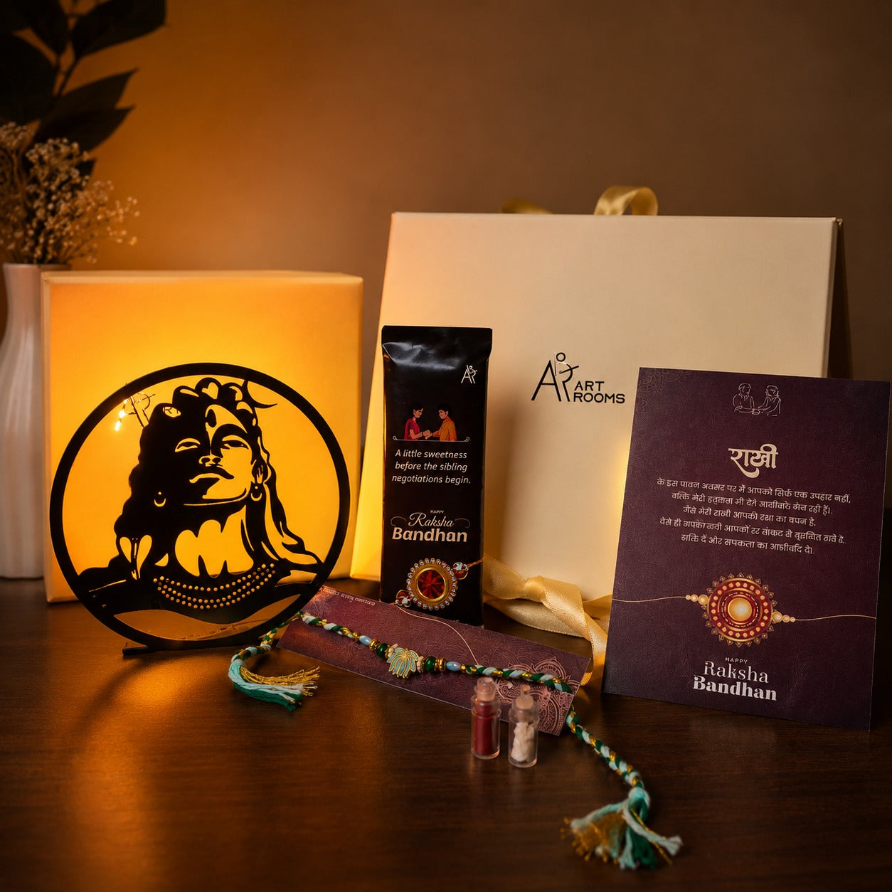 Raksha Bandhan Gift Hamper for Brother/Sister – Lord Shiva LED Tabletop Décor, Rakhi Set with Roli Chawal, Greeting Card & Chocolate Bar