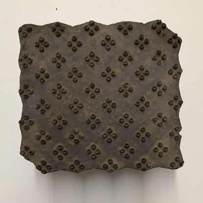 Vintage Indian wooden printing block featuring dotted floral cluster design