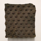 Antique hand-carved wooden stamp block with dotted mango seed pattern