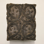 Rustic wooden block for printing with traditional paisley motif hand-carved