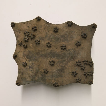 Vintage Indian wooden block featuring scattered small flower clusters carved into aged wood