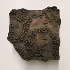 Rustic Indian printing block featuring hand-carved vine and leaf-inspired clusters
