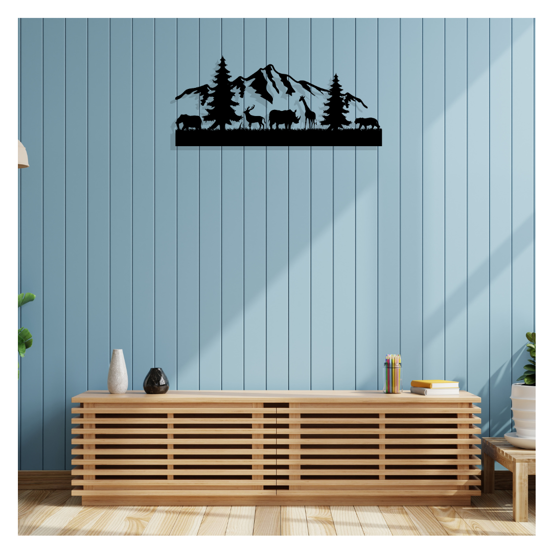 Nature metal wall art with mountain and animal design displayed on blue paneled wall above wooden console.